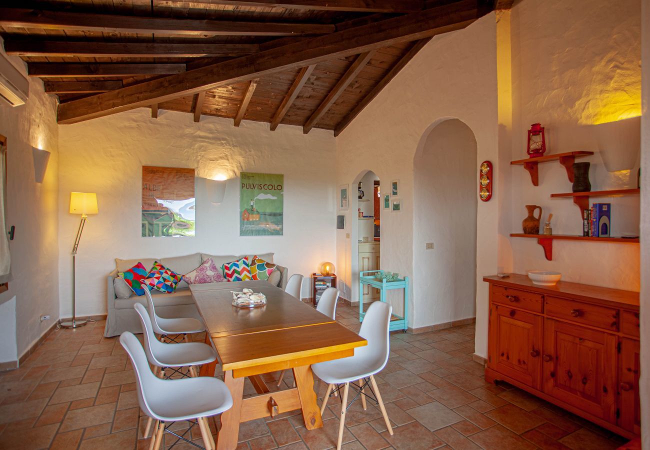 Villa Kalè - sala da pranzo luminosa con tavolo e sedie moderne, villa per vacanze