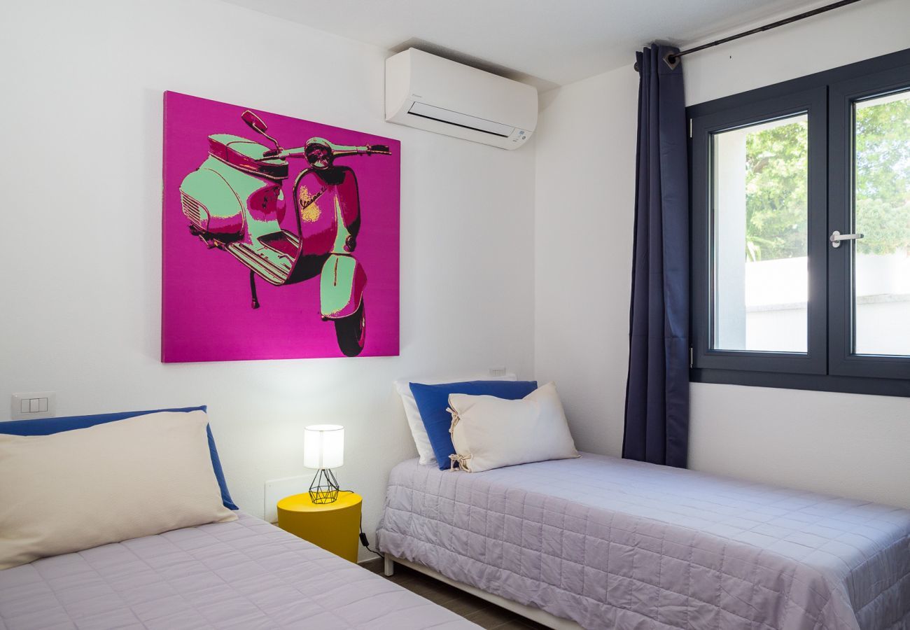 WLofts 13 - Camera con letti singoli, ideale per famiglie in casa vacanze in Sardegna vicino alle spiagge