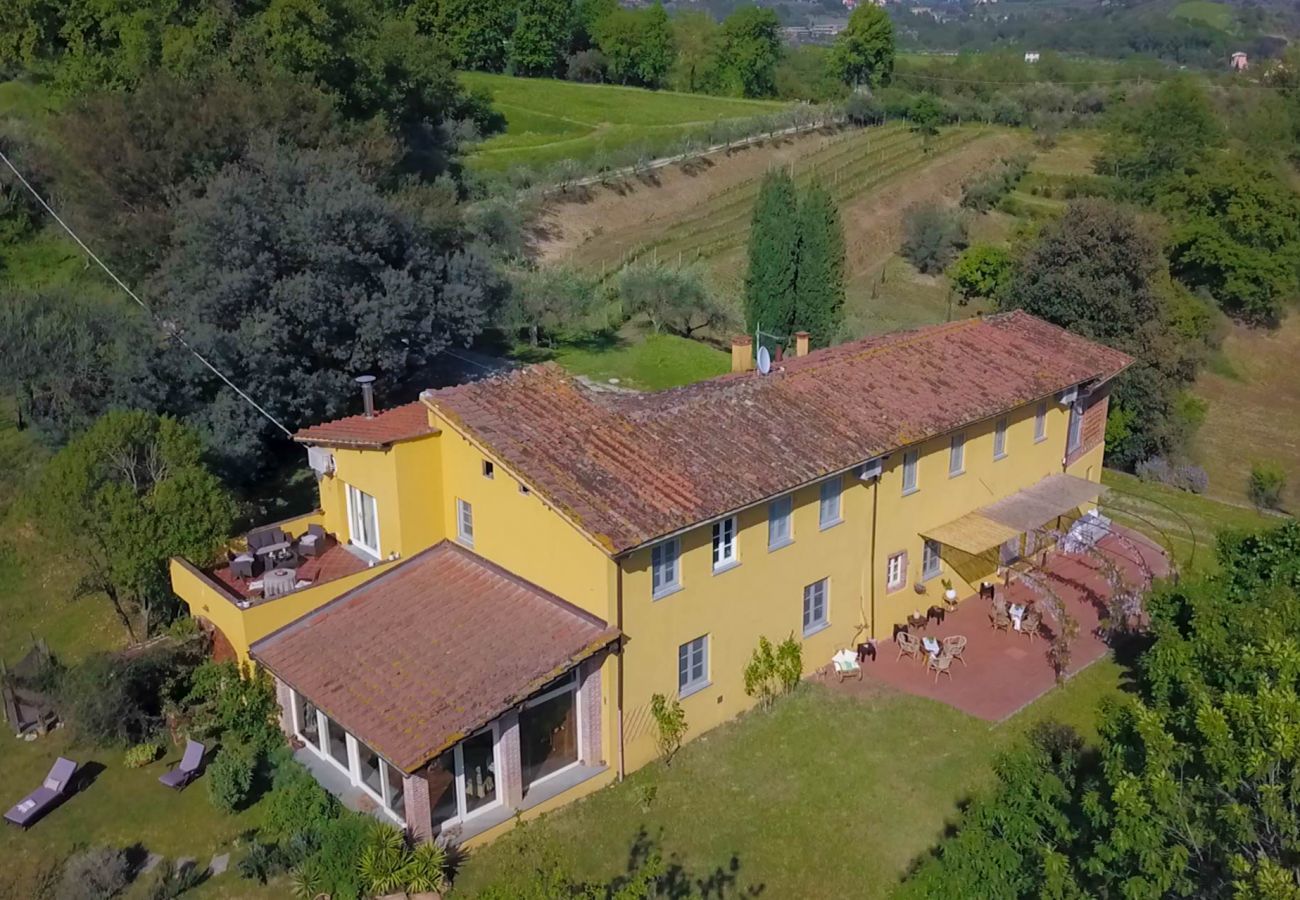 Villa in Capannori - Villa Lorena, a Family Vintage Home with Indoor Pool, Air Conditioning, Outdoor Pool, Fitness Room & Wifi