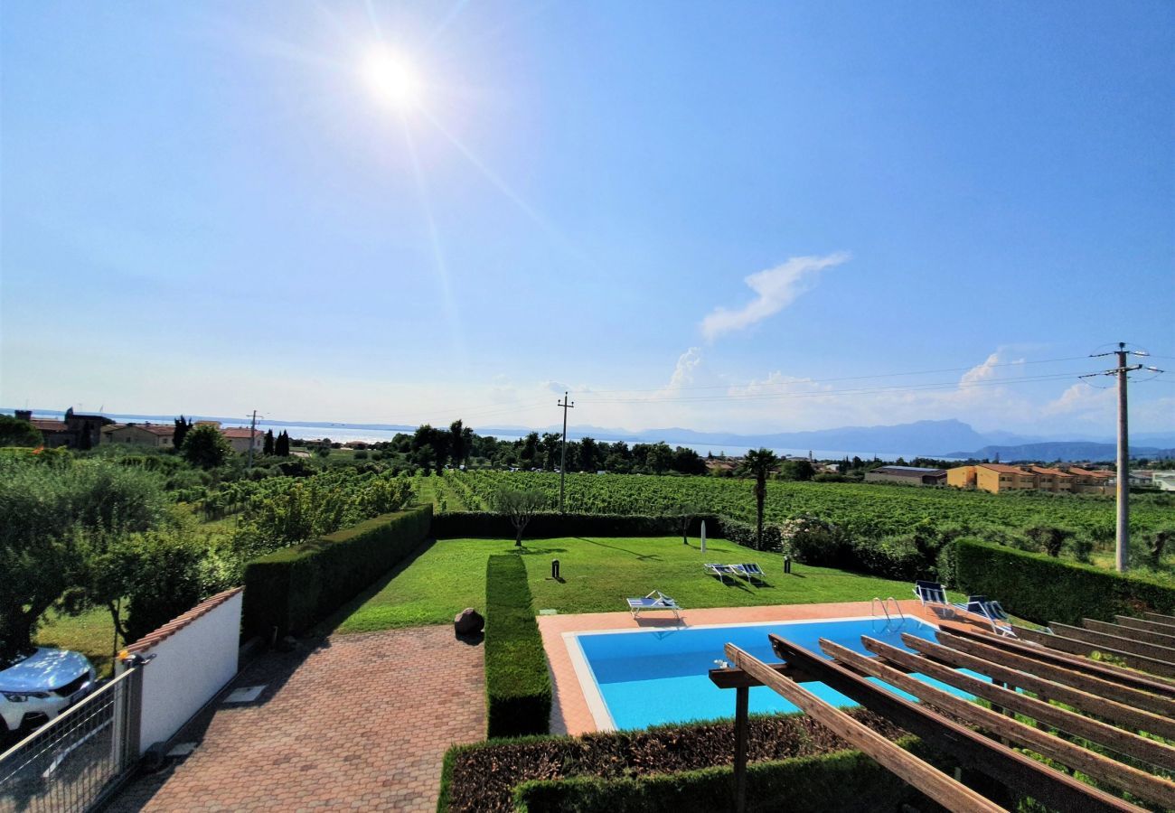 Ferienwohnung in Lazise - Regarda - Wohnung Blanco mit wunderschöner  Seeblick und Pool