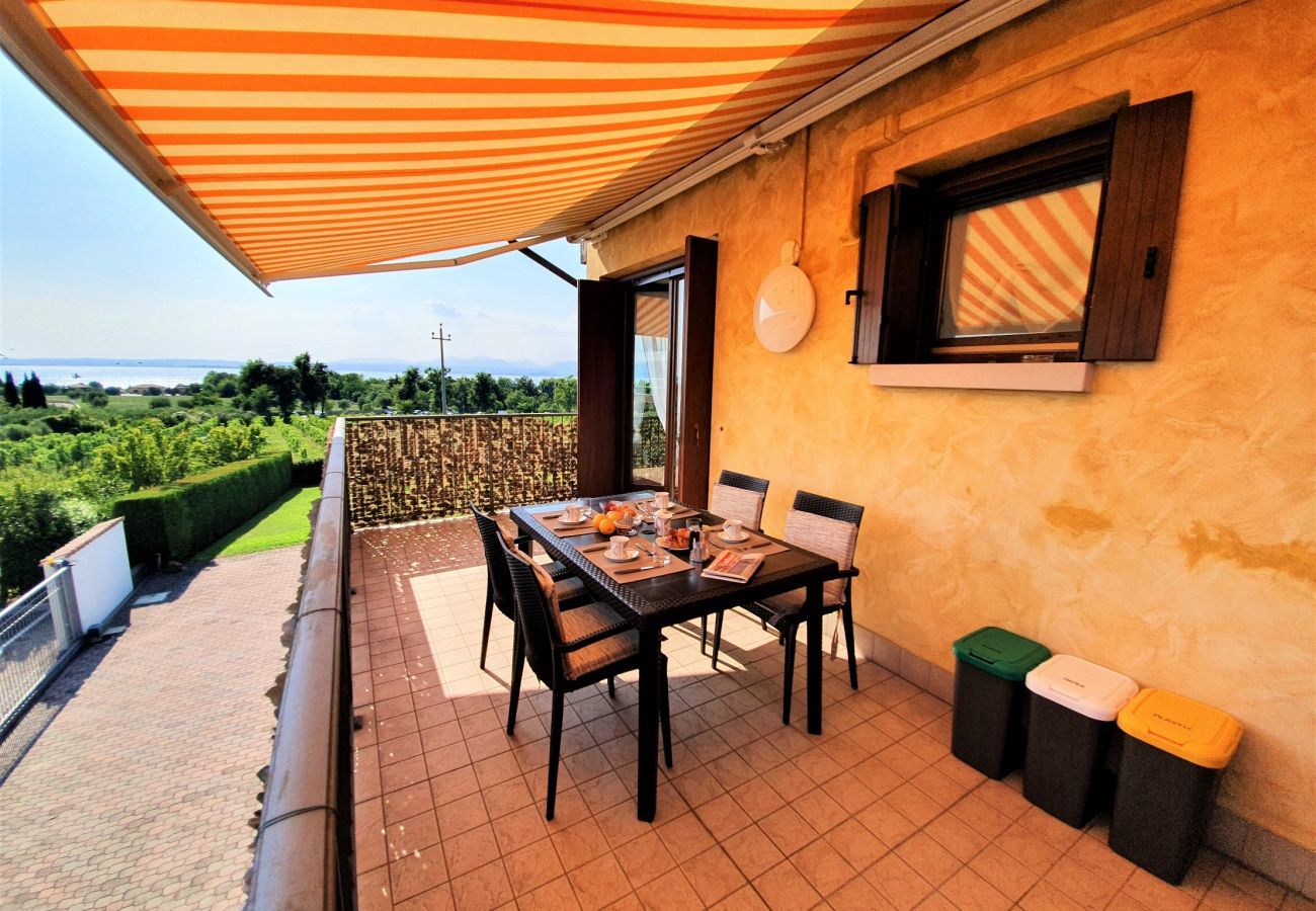 Ferienwohnung in Lazise - Regarda - Wohnung Blanco mit wunderschöner  Seeblick und Pool