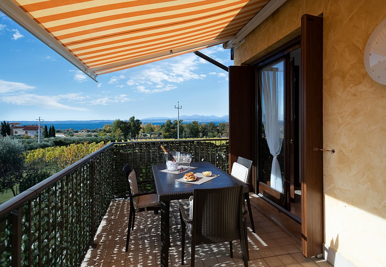 Ferienwohnung in Lazise - Regarda - Wohnung Blanco mit wunderschöner  Seeblick und Pool