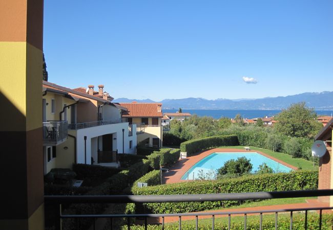 Appartement à Lazise -  Regarda - appartement Miralago 2 avec piscine, vue sur le lac, acceptant les animaux de compagnie.